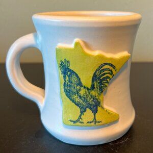 Handcrafted White Matte Pottery Mug with Rooster on Minnesota Shaped Medalion